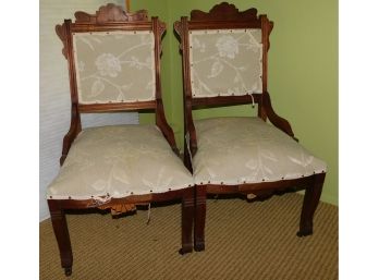 Antique Eastlake Style Pair Of Wooden Cushioned Chairs On Wheels