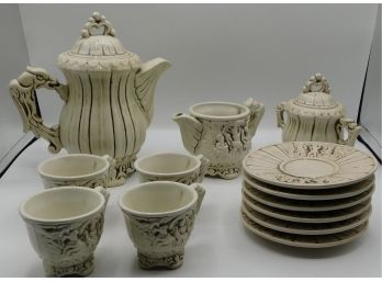 Traditional Beige Tea Set With Decorative Accents