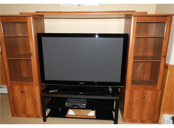 Spacious 4-door Entertainment Center With Storage Compartments