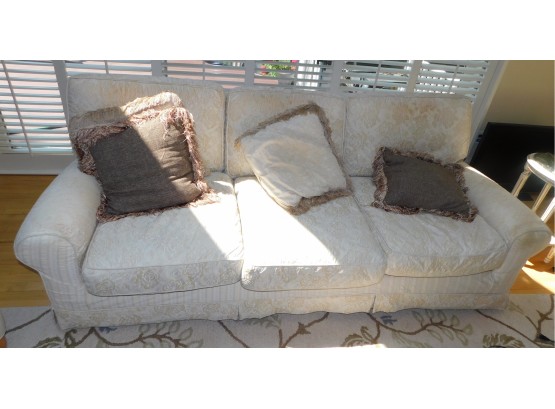 Stylish Beige Sofa With Throw Pillows