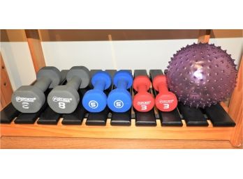 Assorted Set Of Dumbbells And Exercise Ball