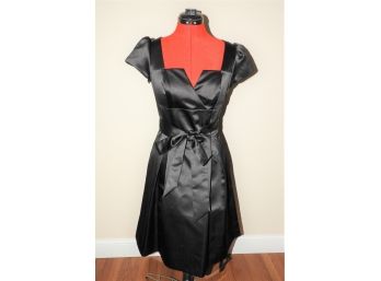 Elegant BCBG Paris Black Dress - Size 8 Bow Tie Waist Closure.