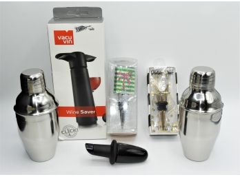 Wine Accessories: 1 Vacu Vin Wine Saver, 2 Stainless Drink Shakers, 2 Bottle Stoppers,  & 1 Wine Pourer