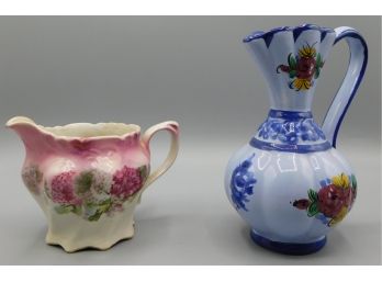 Pair Of Ceramic Coffee Creamers With Floral Design - One Pink And One Blue