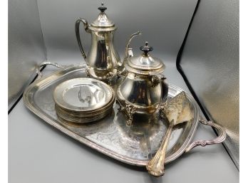 Cresent And Sheffield Co Lot Of  Silver Plated Teapot, Creamer, Saucers, Serving Platter And Cake Cutter