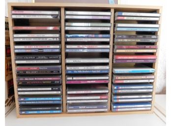Shelf Of Assorted Music CD's