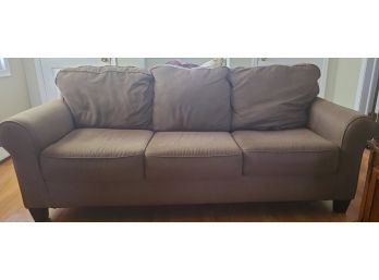 Ashley Furniture Brown Cushioned Sofa