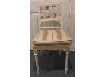 Vintage White Rattan Chair With Striped Cushion