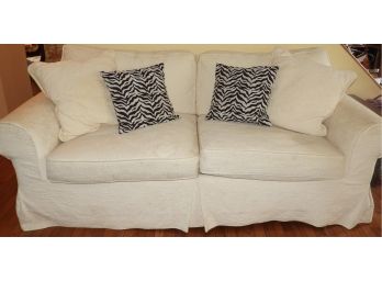 Ivory Upholstered Sofa With 4 Throw Pillows