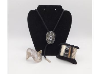 Vintage Bolo Tie With Pair Of Silver Tone Cuff Bracelets