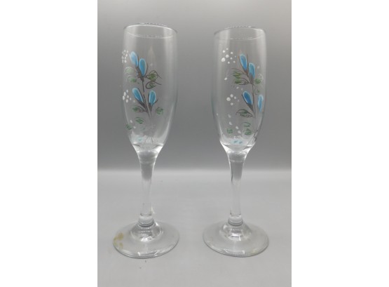 Pair Of Floral Design Flute Drinking Glasses