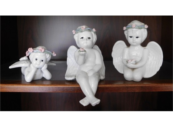 Lovely Set Of Porcelain Angel Figurines