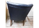 Studded Tufted Blue Leather Chair With Wooden Arms