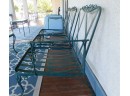 Vintage  Sofa With Blue Seat Cushions And Round Glass Top Table Seats 3