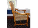 Hand Carved Wooden Armchair With Cushioned Seat And Back