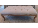 Large White Cushioned Ottoman With Wooden Base