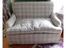 Lavender And Green Striped Sofa With Throw Pillows