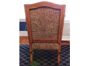 Hand Carved Wooden Armchair With Cushioned Seat And Back