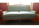 Lovely Vintage Sofa With Green Plaid Upholstery And Wooden Frame