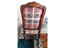 Hand Carved Wooden Chair With Red Plaid Seat Cushions