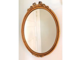 Decorative Oval Shaped Mirror With Bow Style Gilt Gold Frame