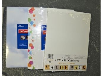 Assorted Sheet Protectors And Printing Paper