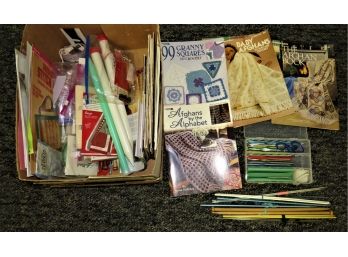 Assorted Crochet Books And Needles