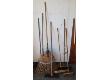 Assorted Lot Of Rakes & Brooms