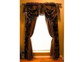 Navy Blue Drapery Window Treatment With Gold Trim