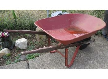 Red Metal And Wood Wheel Barrel