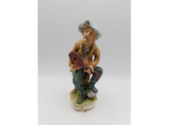 Royal Porcelain Man With Banjo Figurine
