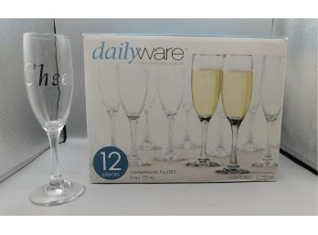 Set Of 12 Dailyware Champagne Flutes In Box - Labeled Cheers