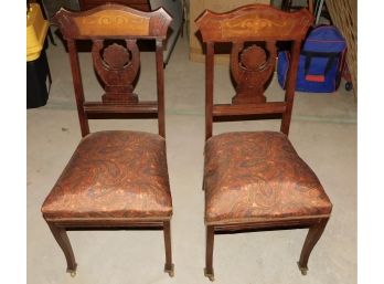 Vintage Pair Of  Solid Wood Upholstered Dining Chairs On Caster Wheels