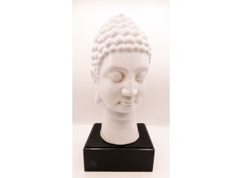 White Ceramic Bust Of Buddha On Wooden Box