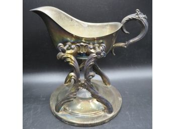 F.B. ROGERS SILVER COMPANY Tilting Silver Plate Gravy Boat With Candle Warmer Stand
