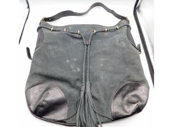 Stone Mountain Drawstring Leather Tassel Handbag