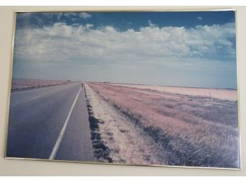 Cyclist Riding On Open Road Photograph In Poster Frame