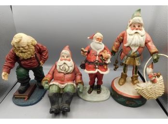 Resin Santa Claus Figurines - 4 Total