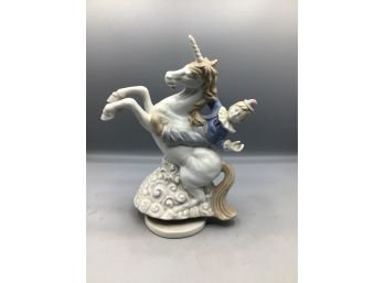 Porcelain Hand Painted Boy Riding Unicorn Music Box Figurine