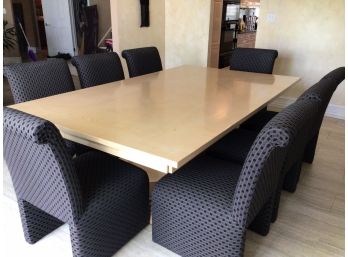 Glossed Wooden Dining Table With Cushioned Upholstered Chairs