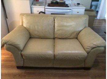 Tan Leather Cushioned Loveseat