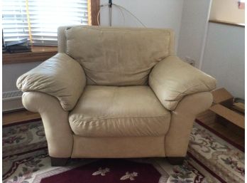 Tan Leather Cushioned Arm Chair