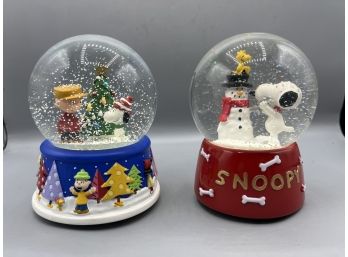 Peanuts Worldwide 2014 Holiday Snow Globes - 2 Total