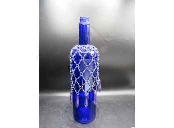 Blue Glass Bottle With Beaded Bottle Wrap