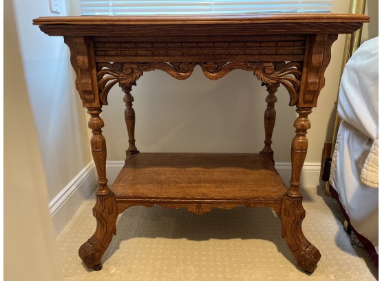 Carved Wood Accent Table On Wheels