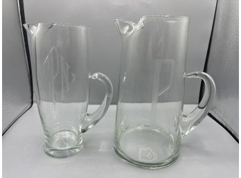 Pair Of Etched Glass Pitchers