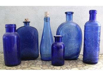 Assorted Blue Glass Bottles, 6 (89)