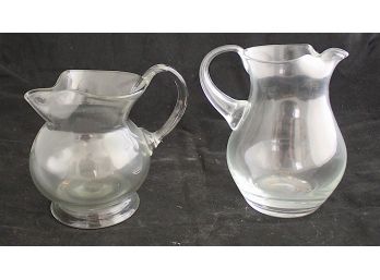 Two Glass Pitchers (140)