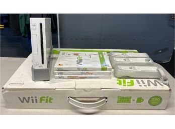 Wii Gaming Console, 4 Remotes, 3 Wii Games, & Wii Fit Mat - 8 Pieces