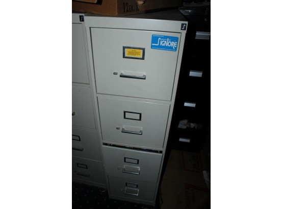 Four Drawer Metal File Cabinet 15' X 27' 52' (O093)